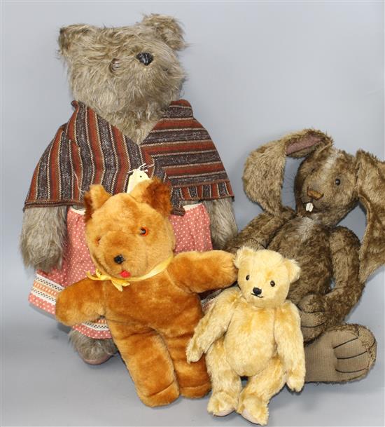 A collection of assorted modern and vintage soft toys including Steiff